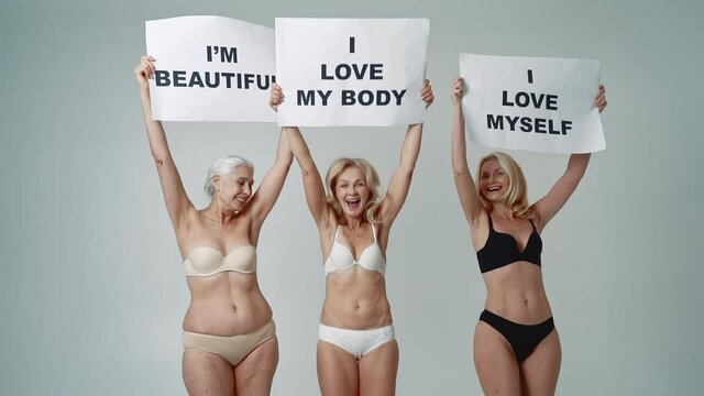 Cinematic footage of three senior women posing in lingerie. Conceptual video about body positivity and self acceptance