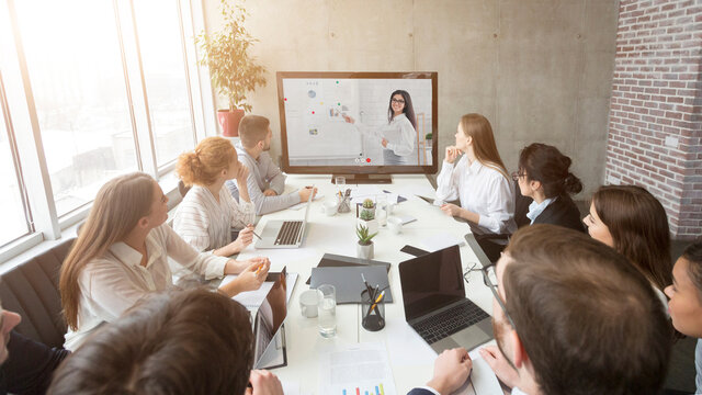 Business Team Having Online Meeting In Office, Making Video Call