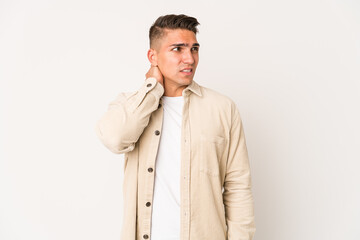 Young caucasian handsome man isolated suffering neck pain due to sedentary lifestyle.