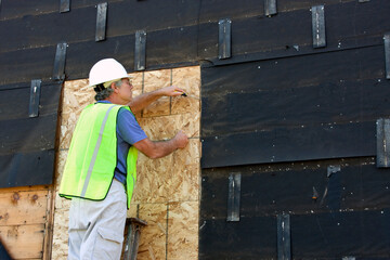 carpenter on a ladder