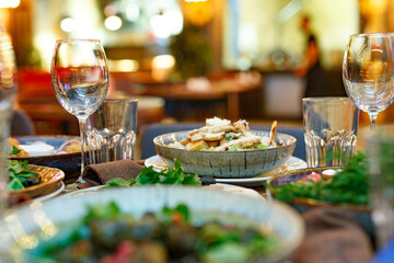 Served table set at restaraunt in the evening