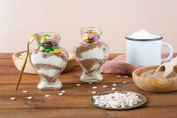 Chocolate chips cookies ingredients in a glass jar. Christmas concept