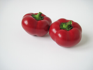 red bell peppers on a white background