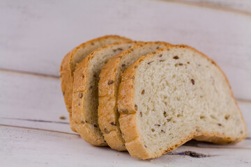 a sliced bread on a wooden table