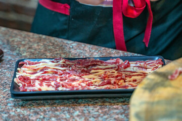 The thin sliced beef to make hotpot in Chaozhou, Guangdong province, China.