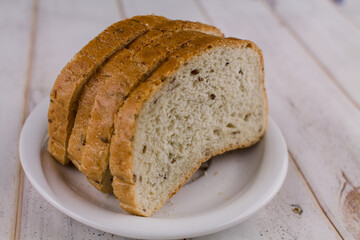 a sliced bread on a wooden table