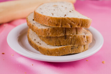 sliced bread with a rolling pin on the cloth