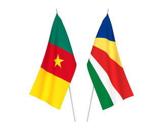 National fabric flags of Seychelles and Cameroon isolated on white background. 3d rendering illustration.