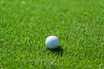 Golf balls on artificial grass with blur background

