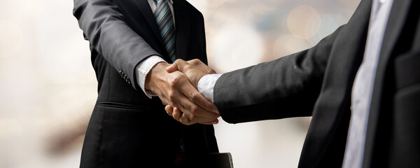 Handshake of customer and investor or hand of successful business people shake hand after success...