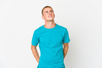 Obraz premium Young caucasian handsome man relaxed and happy laughing, neck stretched showing teeth.