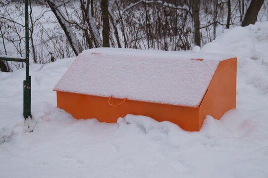 Snow-covered Orange Sand Chest Against Fires
