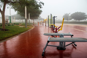 Outdoor gym equipment on foggy morning in the park. Outdoors