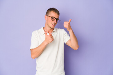 Young caucasian handsome man raising both thumbs up, smiling and confident.