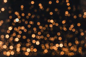 Gold bokeh blur defocus in black use for background
