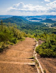 Fototapeta premium View on the Chaine de Puys volcanoes from the top of the Puy de la Vache volcano in Auvergne, France