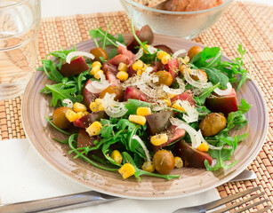 fresh vegetarian healthy vegetable salad with arugula