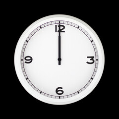 White round analog wall clock isolated on black background.