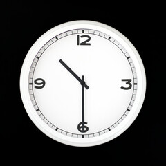 White round analog wall clock isolated on black background.