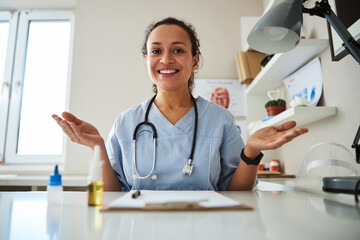 Woman medic shrugging helplessly over a notepad