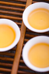 Three cups of tea on tray,close-up