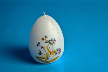 Easter egg on blue background