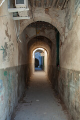 An alleyway under arches in Tripoli, Libya, in Ghadema, or the medina, or old city.