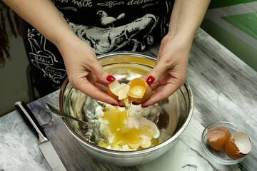 Making dough by female hands at home