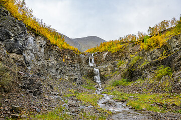 Small waterfall on a rock face in Norway