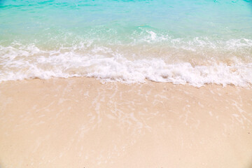 Fototapeta na wymiar Sand beach with wave bubble seascape in lipe islands for travel in thailand