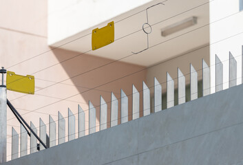 high electric fence with blank yellow tag, security fence system for house protection.