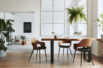 Stylish and botany interior of dining room with design craft wooden table, chairs, a lof of plants, window, poster map and elegant accessories in modern home decor. Template.