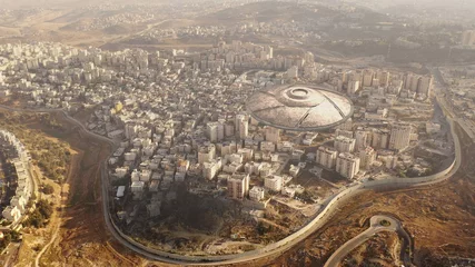 Fototapeten Large Alien spaceship sacuer ufo over refugee Camp, Aerial , Aerial drone view with visual effect element, invasion sci fi concept, Palestine  © ImageBank4U