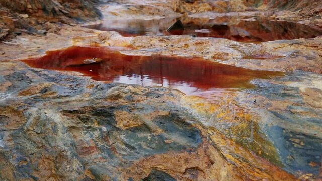 
Reddish water at the source of the Rio Tinto in Huelva

