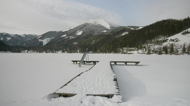 Lake in Austria frozen with snow