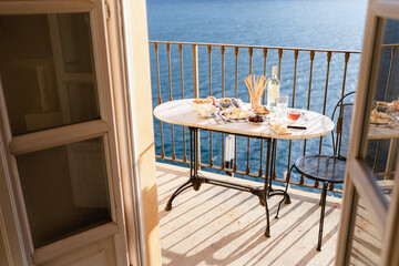 
breakfast on the balcony overlooking the lake