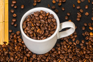coffee mug and grains beans seed roasted