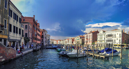 Fototapeta na wymiar Venice, Italy - September 03, 2018: Wide angle panorama shot of canal view from Rialto bridge