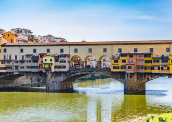 Fototapeta na wymiar View of medieval stone bridge Ponte Vecchio and the Arno River in Florence, Italy