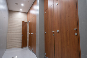 Public toilet doors wood grain