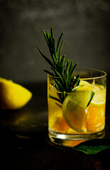 Citrus tonic drink with rosemary.