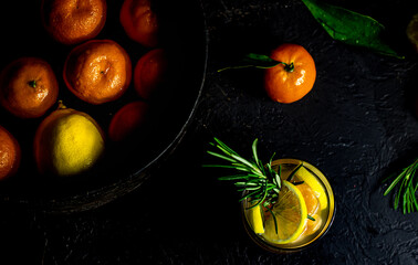 Citrus tonic drink with rosemary.
