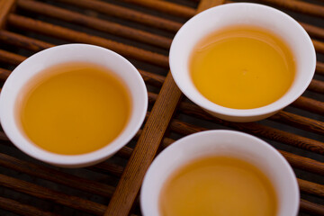 Three cups of tea on tray,close-up