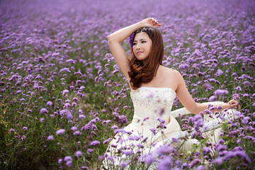 Fototapeta na wymiar Beautiful bride standing Lavender