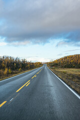 Street through a wild landscape in Norway