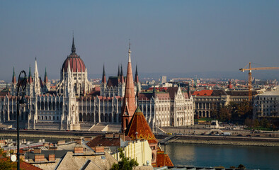 Naklejka premium View of the tower Hungarian parliament on the river Danube of the historic Old Town of Budapest Hungary from a height.