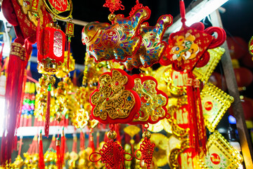 lucky knot lunar new year decoration in Vietnam with gold and red colours. Asian new year. Chinese lunar new year background.