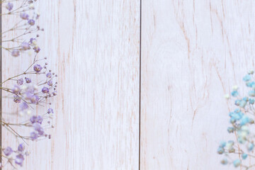 Dry flowers on wooden background, selective focus, spring mood