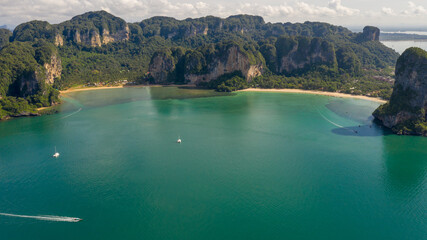 amazing Thailand high season beautiful seascape aerial view ao nang beach island and long tail boat...