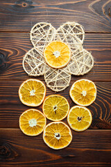Fototapeta na wymiar orange chips and decorative flower in circle